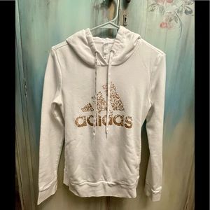 Adidas almost new xsm white hoodie with pockets, gold logo. Sold out elsewhere.